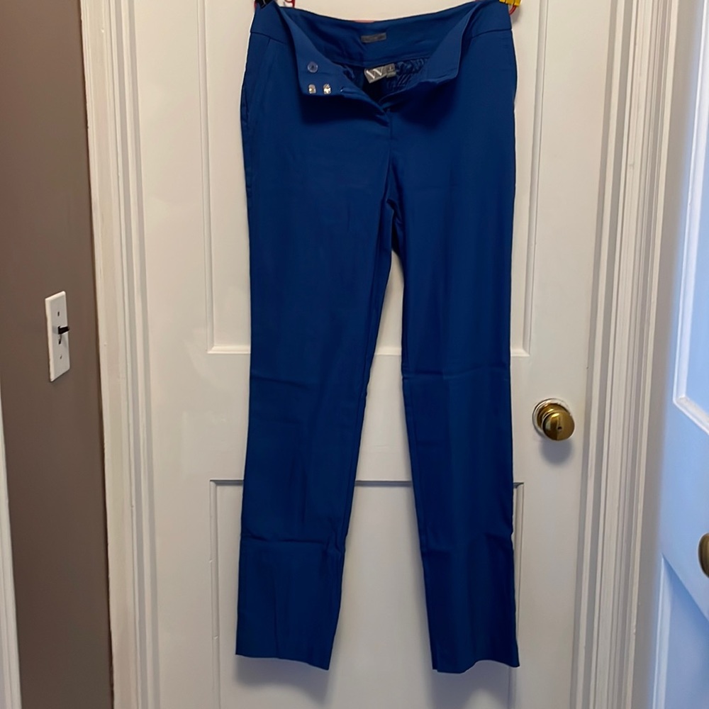 Blue trousers, long.